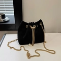 Chic black corduroy bucket bag with pearl drawstring accents and golden chain strap - Black