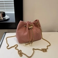 Pink corduroy drawstring bucket bag with gold chain strap and pearl accents - Pink