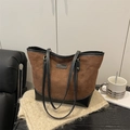 Brown quilted tote bag with diamond stitching and black leather trim for women - Brown