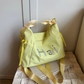 Borsa tote in nylon giallo con ricamo Hai e tracolla regolabile in tessuto - Giallo