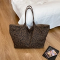 Large leopard print tote bag in brown and black tones with canvas strap detail - Brown