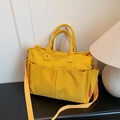 Borsa tote minimalista in velluto a coste giallo con tasche e tracolla regolabile - Giallo