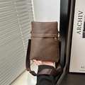 Brown litchi grain small crossbody bag with wide nylon strap and front zipper pocket - Brown