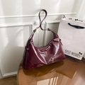 Deep burgundy glossy leather oversized hobo bag with gold hardware and shoulder strap - Red