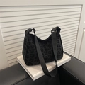 Minimalist black leopard print crescent shoulder bag with wide nylon strap and silver buckle - Black