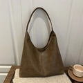 Minimalist coffee brown hobo shoulder bag with matte leather texture and wide strap - Tan