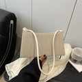 Chic beige woven crossbody bag with herringbone pattern and thin white shoulder strap - With Pendant / Off White