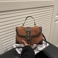 Braune Vintage-Schultertasche aus Wildleder-Patchwork mit großer runder Metallschnalle - Braun