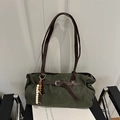 Retro dark green canvas tote bag with leather straps and wooden bead charm detail - Green