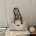 Borsa tote minimalista in tela beige con tracolla in pelle marrone per donne moderne - Marrone