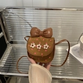 Brown suede crossbody bag with pink dots, white plush flowers and oversized bow decoration - Brown