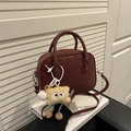 Retro deep wine red shoulder bag in suede texture with a cute plush doll pendant - Red