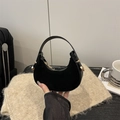 Black crescent handbag in premium suede and leather with gold hardware detail - Black