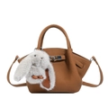 Brown lychee leather bucket bag with silver clasp and grey plush bunny charm - With Pendant / Brown