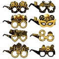Set of eight black and gold 80th birthday party paper glasses with glittery designs - 80th Birthday Glasses