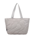 Light gray quilted shoulder bag with wave stitching and branded label on front - Gray