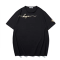 T-shirt uomo oversize nera in cotone con stampa happen dorata e girocollo classico - M / Nero