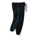 Lockere schwarze Herren-Jogginghose mit hellgrünen Seitenstreifen und Kordelzug am Bund - 3XL / Schwarz