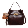 Dark brown oil wax leather bucket bag with gold turn-lock and teddy bear charm - With Pendant / Brown