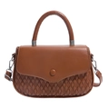 Brown leather handbag with quilted texture and silver metal hardware in 45-degree view - Brown