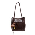 Vintage brown faux leather tote bag with shoulder straps and decorative charms on white background - With Pendant / Brown