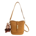 Minimalist camel brown bucket bag in synthetic leather with cute plush bunny charm - With Pendant / Caramel color