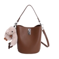 Dark brown pebbled leather bucket bag with silver lock and plush bunny charm - With Pendant / Brown