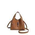 Brown lychee-textured bucket bag with silver rotating lock and crossbody strap - With Pendant / Tan