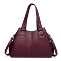 Classica borsa a mano bordeaux in pelle martellata con doppi manici e dettagli in argento - Rosso