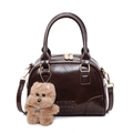 Bolso Boston de cuero encerado marrón oscuro con colgante de perro y oro liso - Con Colgante / café