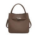 Brown lychee leather bucket bag with top handle and metal lock on white background - Gray