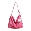 Bolso hobo de lona para mujer con estampado animal fucsia y blanco y borla de peluche - Rosa