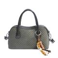 Deep green woven plaid handbag with decorative beaded charm and silver metal hooks - Green