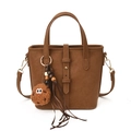 Borsa a secchiello in camoscio marrone con ciondolo cookie in peluche e tracolla - Con Ciondolo / Marrone