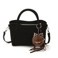Black faux suede bucket bag with cylindrical handles and a cute monster charm - With Pendant / Black