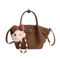Brown bucket bag with pebble leather texture, top handle, and cute plush bear charm - With Charm / Brown