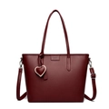 Deep red tote bag for women with litchi texture leather and heart pendant - Fuschia