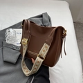 Dark brown leather tote bag with ethnic jacquard strap and metallic rivet detailing - Brown
