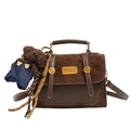 Brown vintage suede crossbody bag with gold buckle and a cute bear charm accessory - Brown