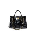 Klassische schwarze gesteppte Ledertasche mit Goldkette und Vintage Drehverschluss - Schwarz