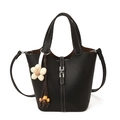 Elegant black bucket bag in lychee leather with white stitching and wood bead charm - With Charm / Black