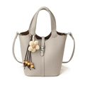 Litchi texture bucket bag with floral pendant and silver buckle in light gray finish - With Charm / Gray