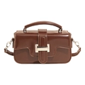Vintage brown leather crossbody bag with silver buckle and top handle on white background - With Pendant / Brown