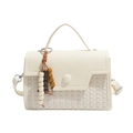 Cream woven texture handbag with matte leather lid and decorative wooden bead tassel - White