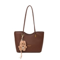 Brown lychee leather tote bag with long handles and a cute brown puppy plush charm - Brown