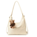 Grand sac cabas blanc crème avec coutures croisées et pendentif ours marron - Avec Pendentif / Blanc