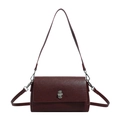 Minimalist deep red leather crossbody square bag with silver metal rotating buckle closure - Angola Red