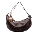 Detail view of a vintage dark brown leather hobo bag with adjustable strap and bear pendant - With Pendant / Brown