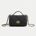Elegant black quilted leather crossbody bag with gold hardware and chain strap - Black