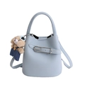 Light blue bucket bag in pebble leather with silver buckle and plush bear charm - With Pendant / Blue